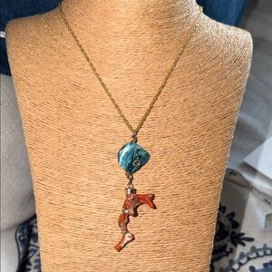 Italian red coral branch  shell with silver embellishments on gf chain